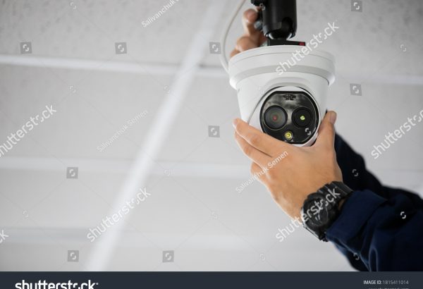 stock-photo-technician-installing-ip-wireless-cctv-camera-by-screwed-for-home-security-system-and-installed-1815411014